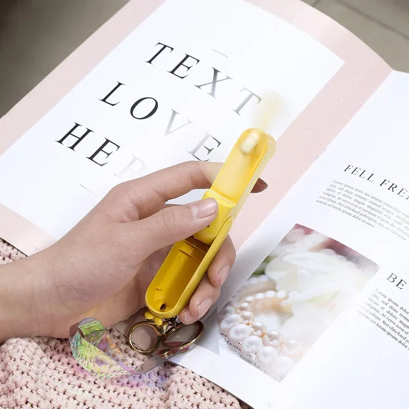Foldable Portable Mini Fan – Quiet, Rechargeable, and Lightweight