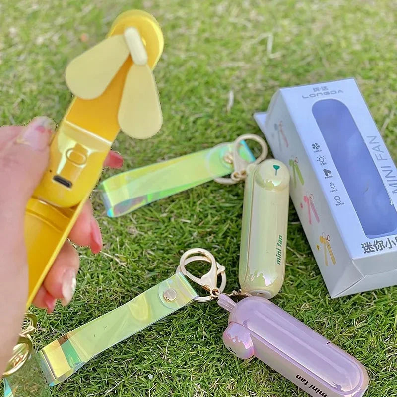 Foldable Portable Mini Fan – Quiet, Rechargeable, and Lightweight